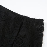 Haut uni asymétrique à manches longues et dentelle 