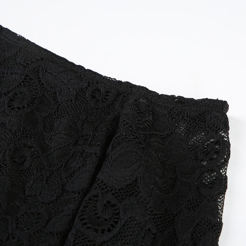 Haut uni asymétrique à manches longues et dentelle 