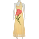 Robe longue à motif floral et dos nu en maille irrégulière 