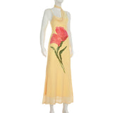Robe longue à motif floral et dos nu en maille irrégulière 