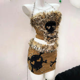 Conjunto de minifalda con estampado de calavera esponjosa y manga larga con cremallera 