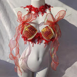 Top con cuello en V, borlas y apliques de concha con cuentas y lazo 