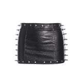 Mini-jupe unie ajourée en cuir PU avec rivets appliqués 