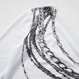 Haut asymétrique à manches longues et imprimé chaîne 