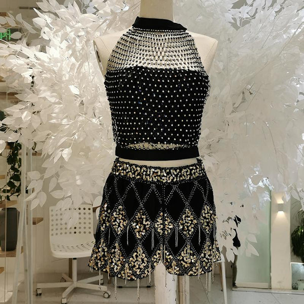 Haut à col ras du cou, boutonné et transparent avec perles 