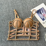 Top acolchado con cuello en V, cremallera y cuentas caladas 