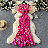 Robe longue zippée à col ras du cou et manches courtes avec broderie florale 