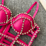 Top acolchado con cuello en V, cremallera y cuentas caladas 