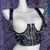 Haut camisole en cuir PU avec fermeture éclair et boucle à motif tête de mort 