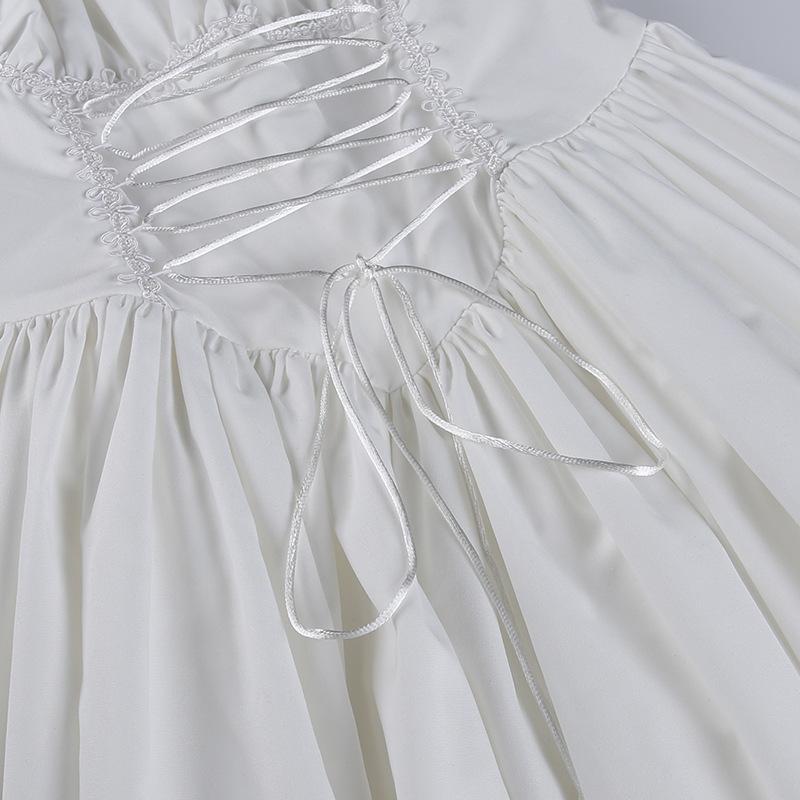 Long sleeve smocked lace up lace hem mini dress