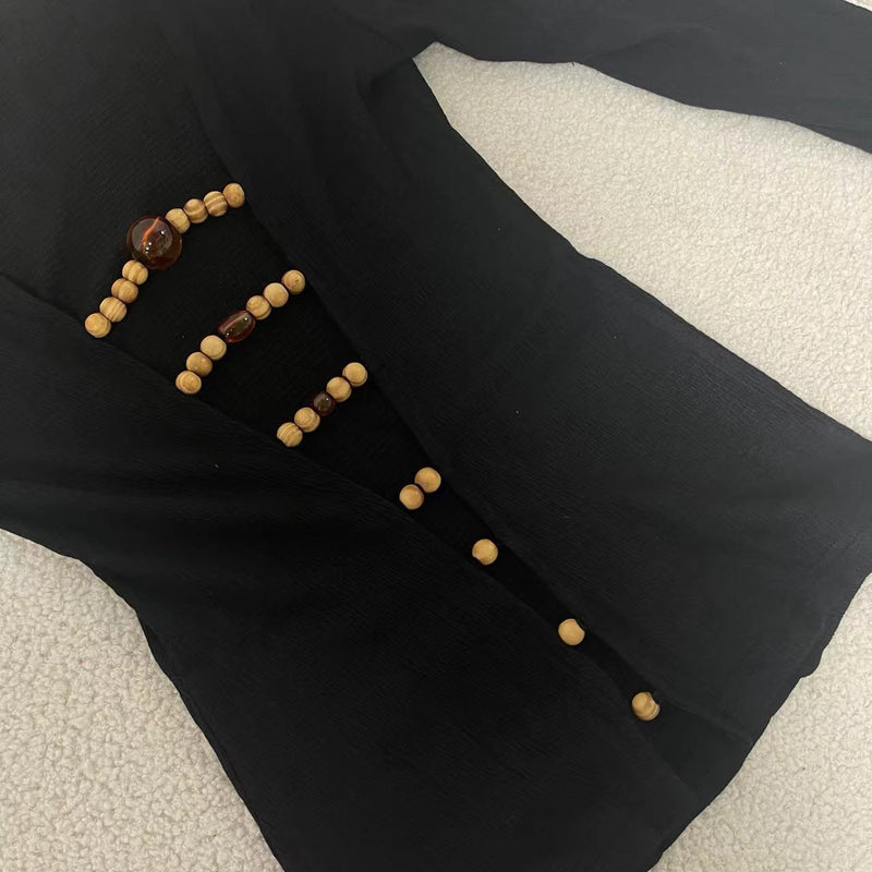 Long sleeve hollow out beaded v neck top