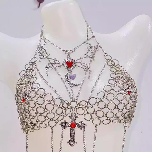 Cadena de metal con aplique cruzado y anillo tipo halter 