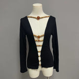 Long sleeve hollow out beaded v neck top