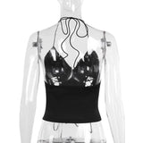 Top liso con cuello en V, espalda descubierta, cordones y lazo en el cuello 