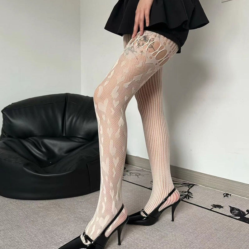 Collants résille ajourés à motif cœur 