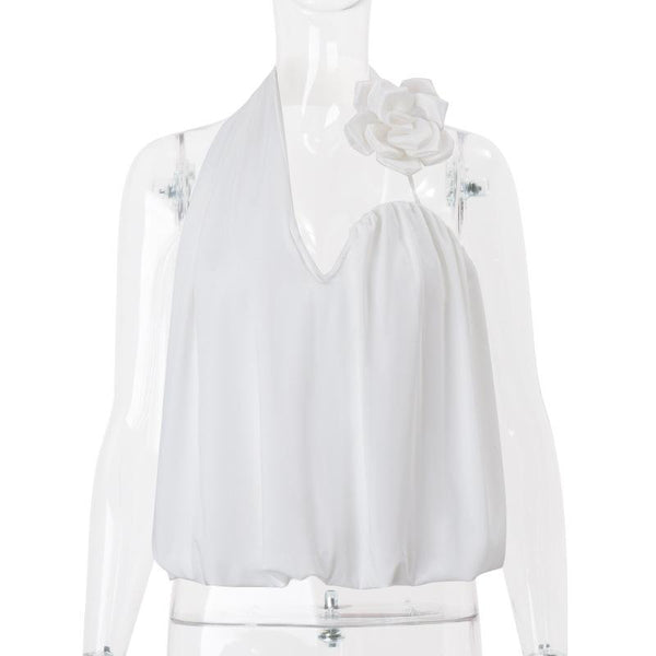 Top sin espalda con apliques florales irregulares y cuello halter 