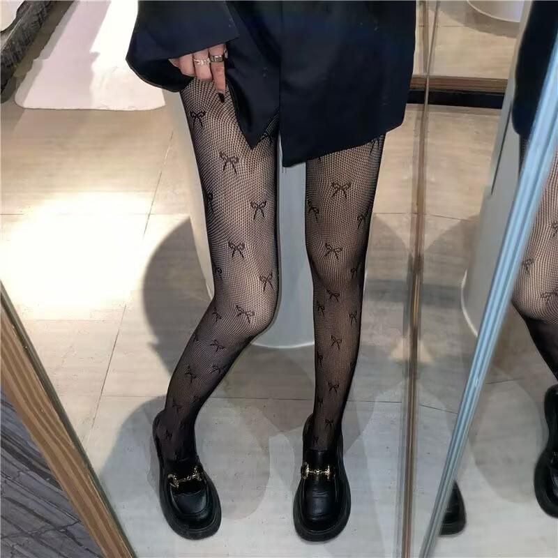 Collants résille à motif nœud papillon 