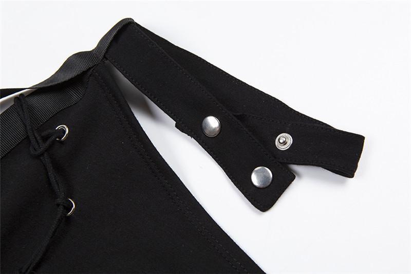 Top con hebilla irregular y botones de manga larga con un solo hombro 
