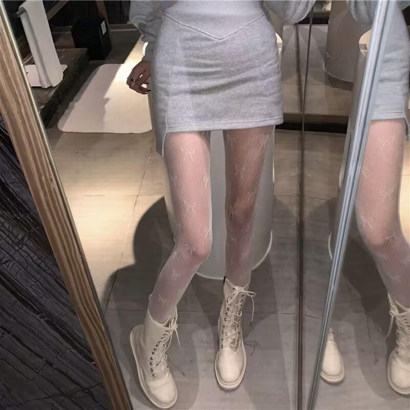 Collants résille à motif nœud papillon 