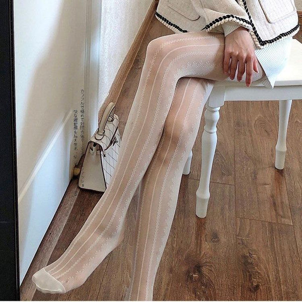 Medias de malla transparente con rayas verticales de encaje 