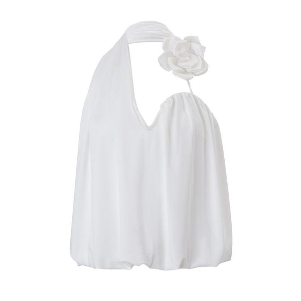 Top sin espalda con apliques florales irregulares y cuello halter 