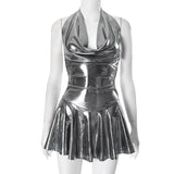 Minivestido metalizado con cuello halter, espalda descubierta y lazo 