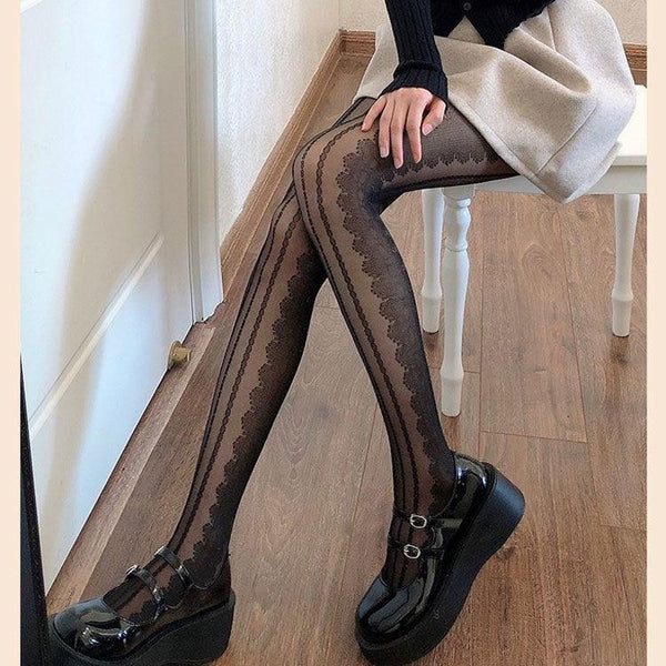 Medias de malla transparente con rayas verticales de encaje 