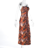 Robe midi camisole fendue à imprimé léopard et ourlet en dentelle avec nœud papillon 