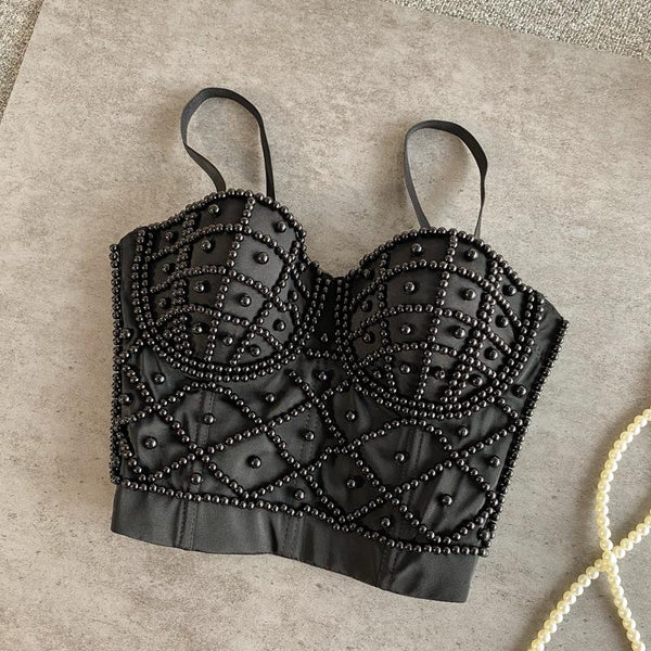 Top camisola sin espalda con cuello en V y cuentas y botones 