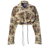 Top con estampado de flores, manga larga, cierre de cremallera y cordón ajustable 
