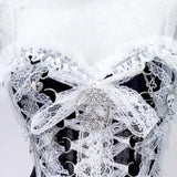 Haut à lacets avec ourlet en dentelle et appliques de crâne, col en V et nœud 