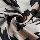 Mini-robe dos nu à manches longues et col ras du cou 