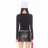 Mini-jupe unie ajourée en cuir PU avec rivets appliqués 