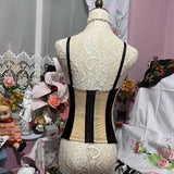 Haut à lacets avec nœud papillon et appliques florales à col en V à volants 