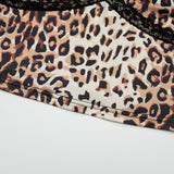 Haut camisole dos nu à imprimé léopard avec ourlet en dentelle et col en V 