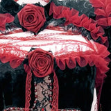 Robe longue à manches longues avec appliques florales et volants en plumes 