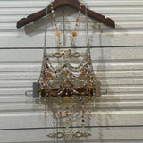 Top de cuentas con cadena de metal y cuello halter ahuecado 
